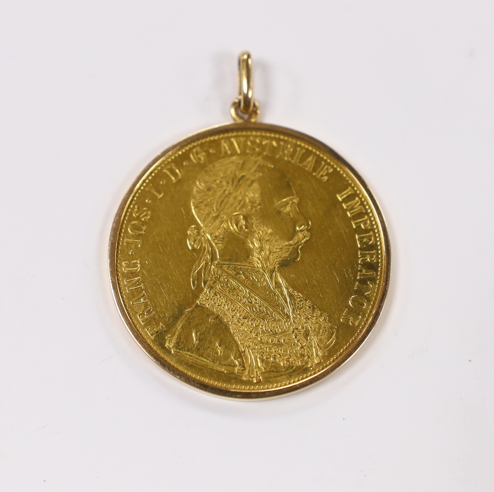 An Austro-Hungarian Empire 1915 4 Ducats gold coin, in later yellow metal pendant mount (re-strike).